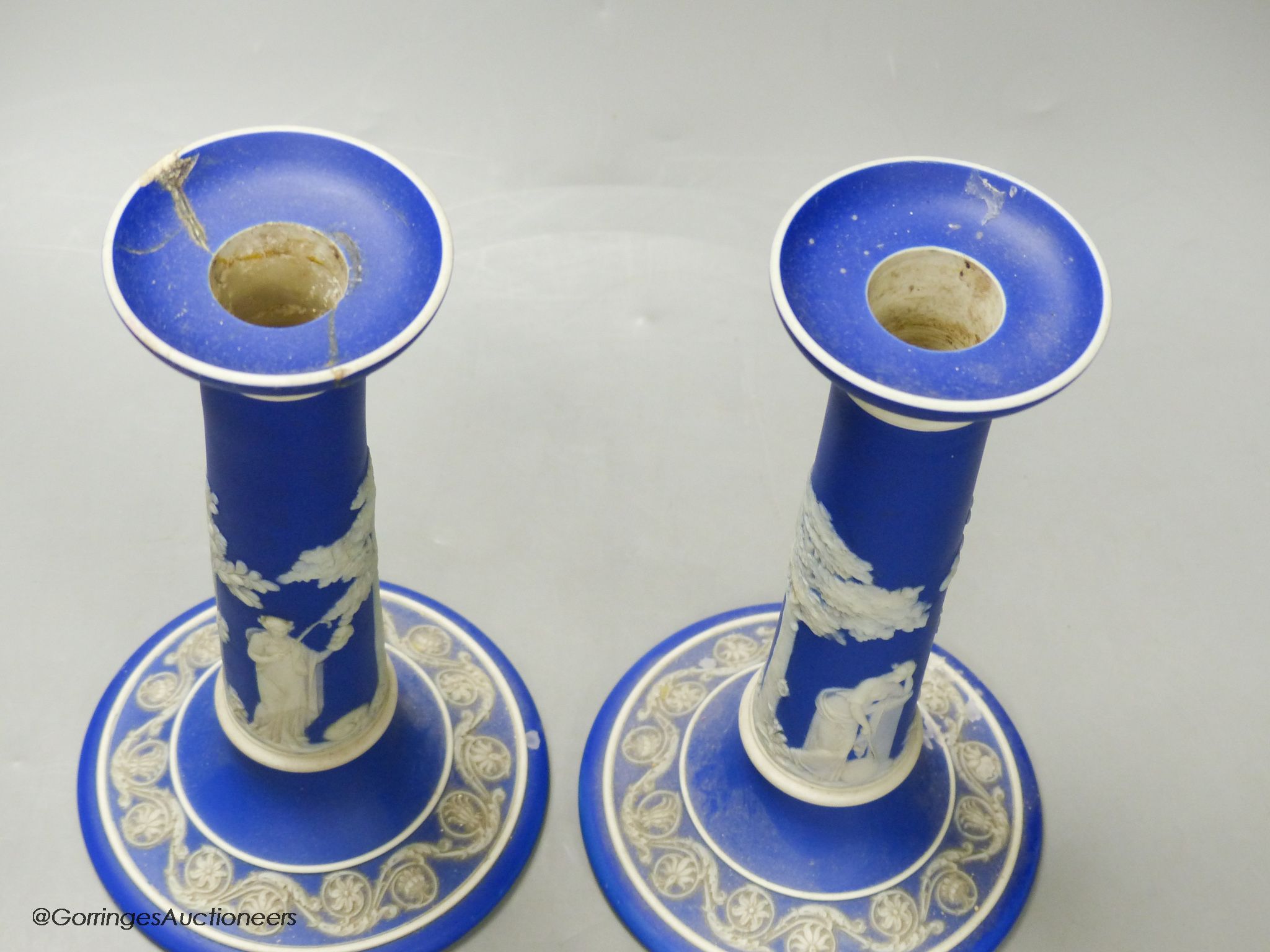 A pair of 19th century Wedgwood blue jasper candlesticks, height 20cm (a.f.)